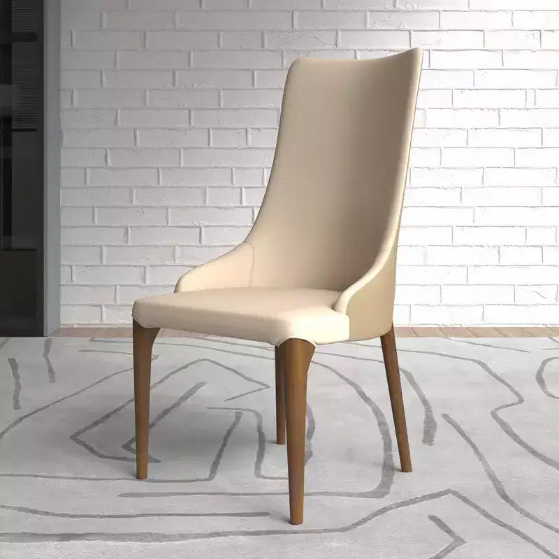Sedia da pranzo imbottita con schienale alto e gambe in legno di frassino